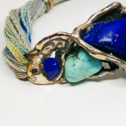 PULSERA ISIS